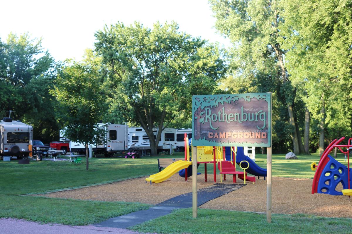 Playground with climbing frame with Rothenburg campground sign